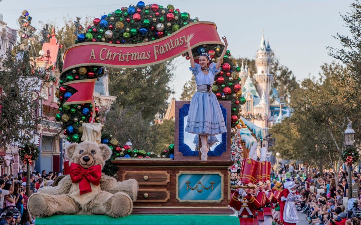 Guests can watch "A Christmas Fantasy" parade daily at Disneyland Park.