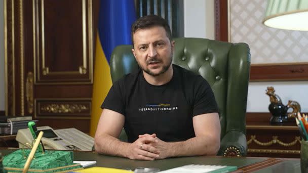 PHOTO: Ukrainian President Volodymyr Zelenskyy delivers his evening address while wearing a shirt with the message 'Stand with Ukraine' on it, Sept. 22, 2022. (Office of the President of Ukraine via YouTube)