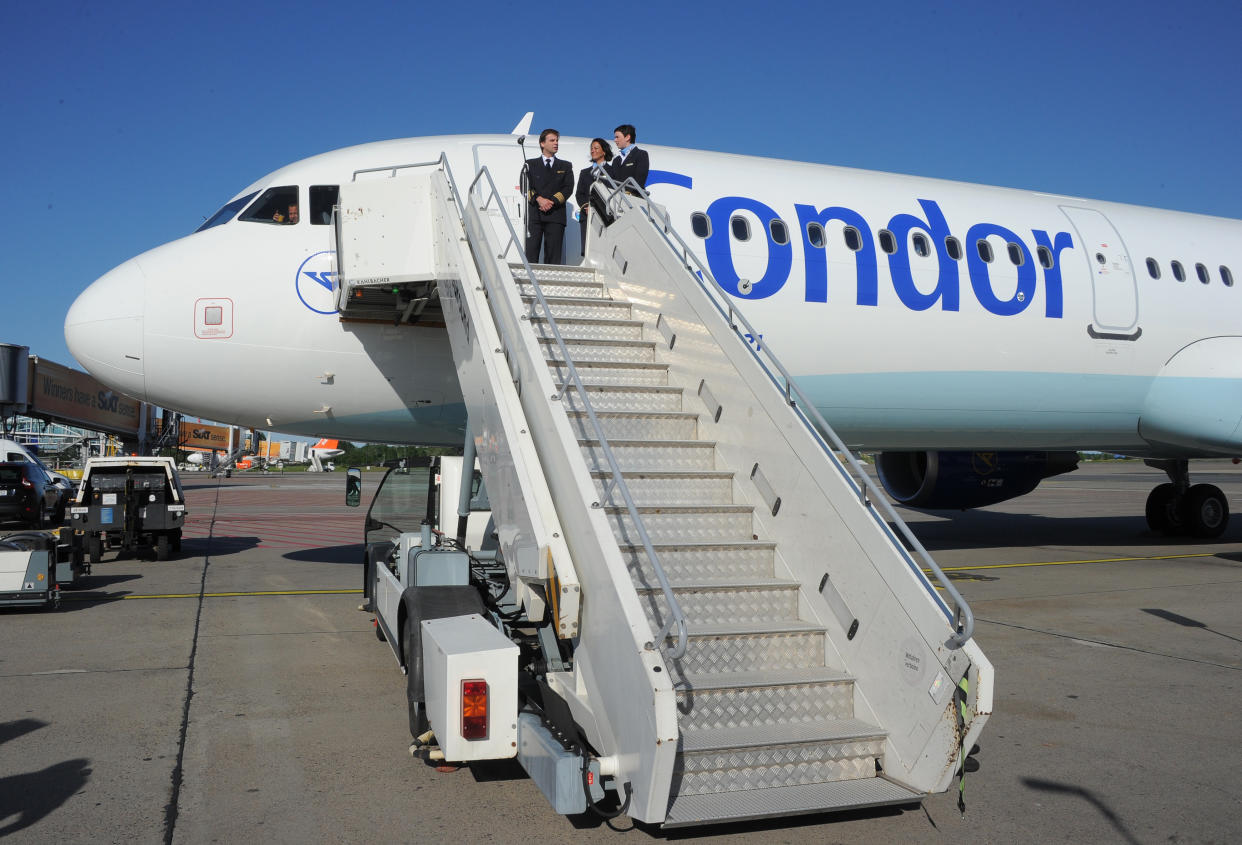 An airbus A321 operated by the German charter airline Condor stands on the tarmac at the airport in Schoenefeld, Berlin, on June 5, 2013. AFP PHOTO / BERND SETTNIK   GERMANY OUT        (Photo credit should read BERND SETTNIK/AFP/Getty Images)