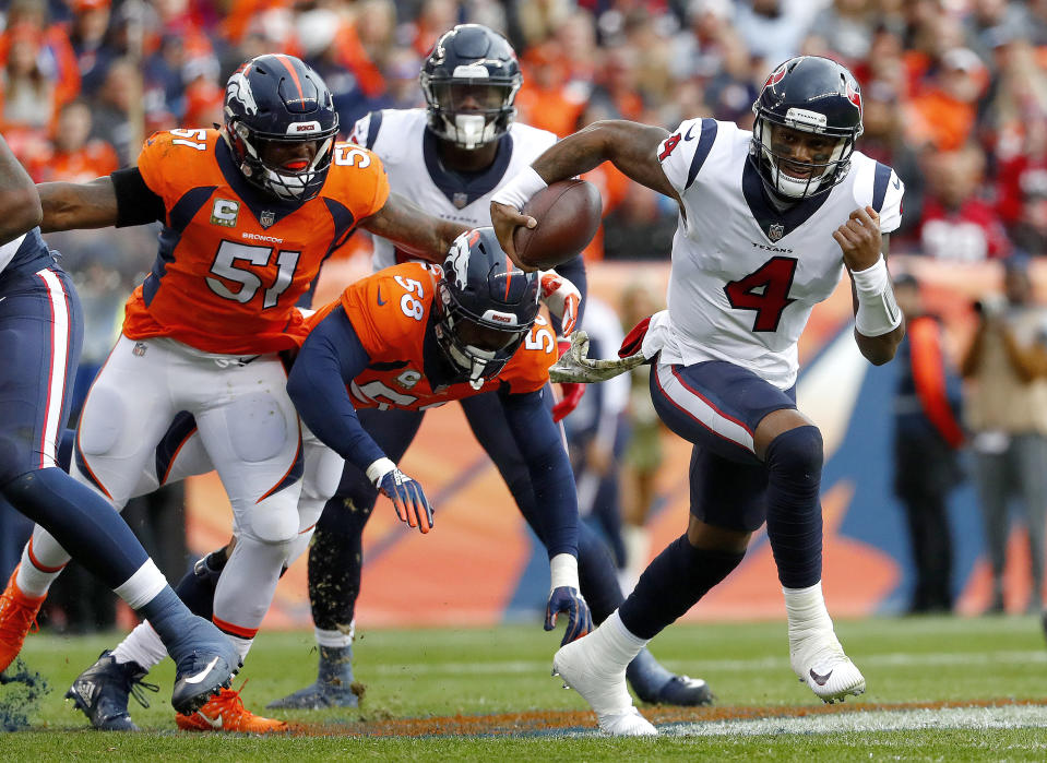 Houston Texans quarterback Deshaun Watson (4) scrambles as Denver Broncos outside linebacker Von Miller (58) and inside linebacker Todd Davis (51) pursue during the first half of an NFL football game, Sunday, Nov. 4, 2018, in Denver. (AP Photo/Jack Dempsey)