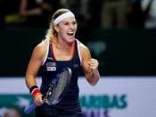 Tennis - Singapore WTA Finals Round Robin Singles - Singapore Indoor Stadium, Singapore - 27/10/16 - Dominika Cibulkova of Slovakia celebrates after defeating Simona Halep of Romania. REUTERS/Edgar Su