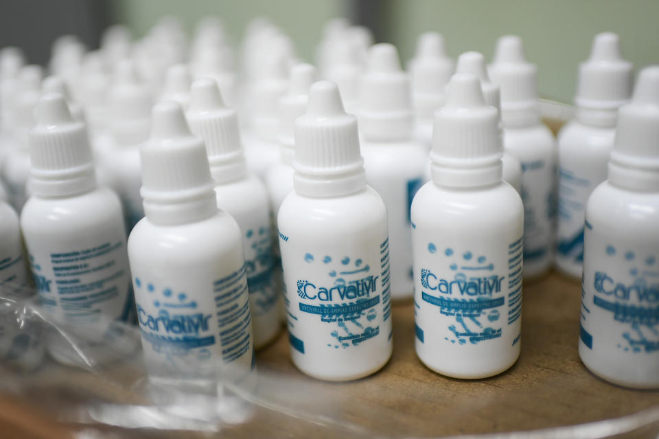 Carvativir bottles sit on a table at a health clinic belonging to the Barrio Adentro government health program in the El Paraiso neighbourhood of Caracas, Venezuela, Thursday, March 25, 2021.