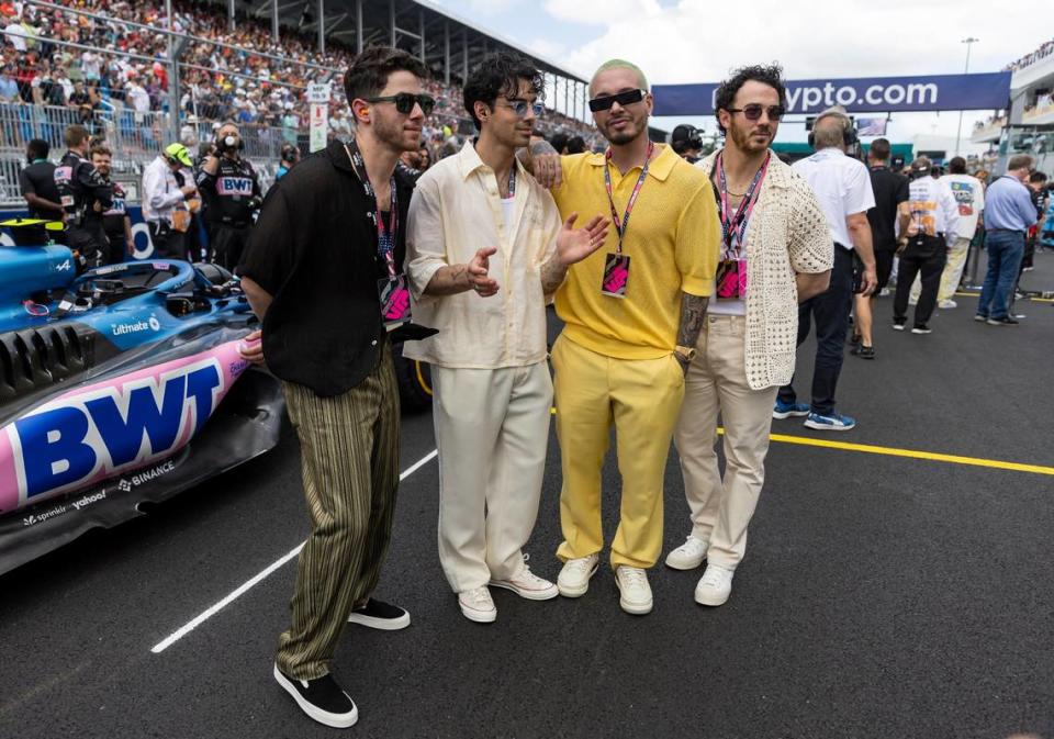 The Jonas Brothers are seen at the grid before the start of the Formula One Miami Grand Prix at the Miami International Autodrome on Sunday, May 7, 2023, in Miami Gardens, Fla.