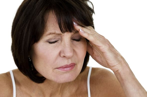 Mature woman with headache