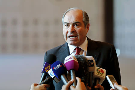 FILE PHOTO - Jordan's Prime Minister Hani Mulki speaks to the media after the swearing-in ceremony for the new cabinet at the Royal Palace in Amman, Jordan, June 1, 2016. REUTERS/Muhammad Hamed/File Photo