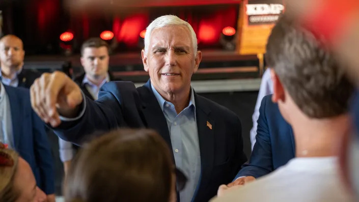 Former Vice President Mike Pence greets supporters after a campaign rally for Gov. Brian Kemp on May 23 in Kennesaw, Ga.