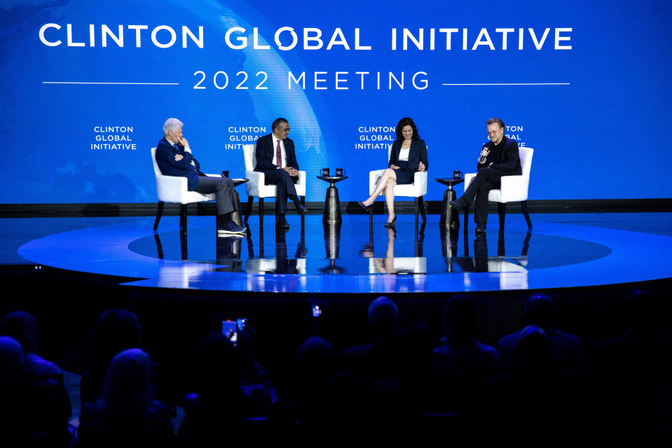 Former President Bill Clinton, from left to right, Tedros Adhanom Ghebreyesus, Karen Miga and Bono Vox participate in a panel at the Clinton Global Initiative, Tuesday, Sept. 20, 2022, in New York. (AP Photo/Julia Nikhinson)