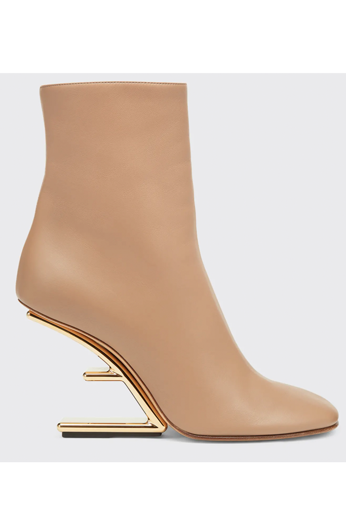 The Fendi Lambskin Metallic F-Heel Ankle Booties. - Credit: Bergdorf Goodman