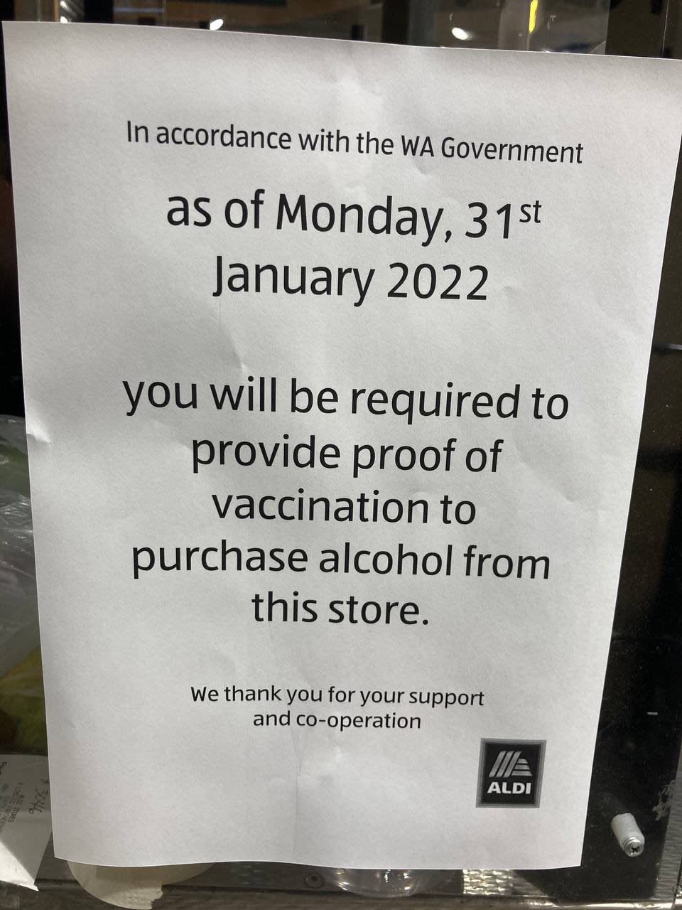 A photo of the sign in a Perth Aldi store in Western Australia saying that you need proof of vaccination to purchase alcohol. 