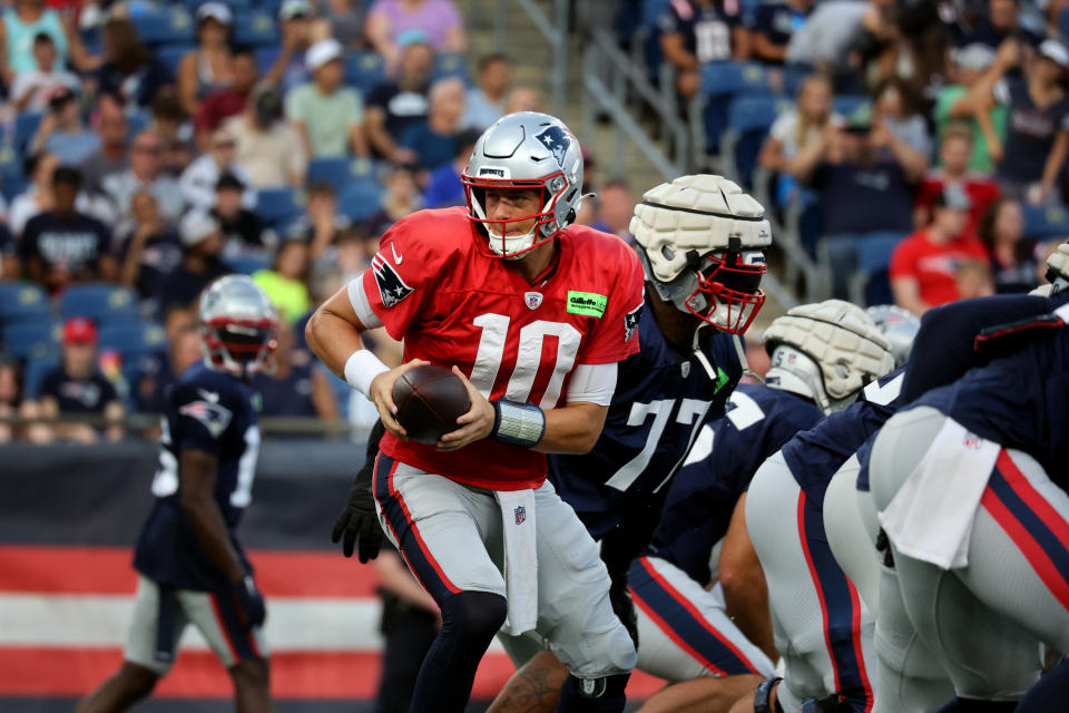Quarterback Mac Jones and the New England Patriots have had a rough training camp. (Photo by Craig F. Walker/The Boston Globe via Getty Images)