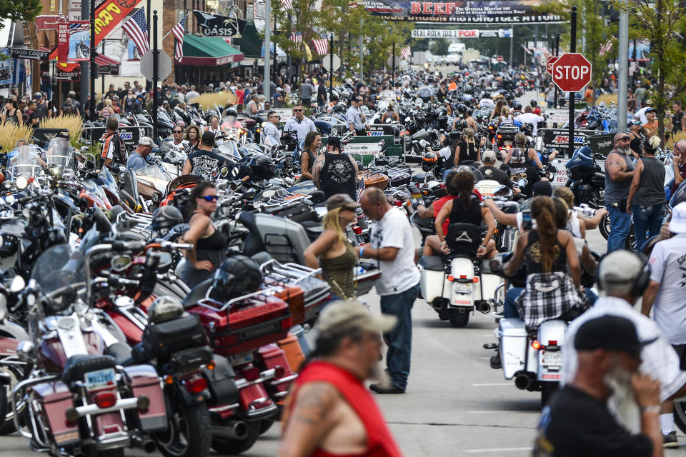 Motorcycles and people crowd Main Street during the 80th Annual Sturgis Motorcycle Rally on August 7, 2020 in Sturgis, South Dakota. According to photos, masks were not widely worn and social distancing was not practiced.  / Credit: Michael Ciaglo / Getty Images
