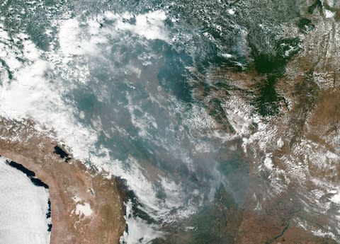 This satellite image provided by NASA shows the fires in Brazil  - Credit: AP
