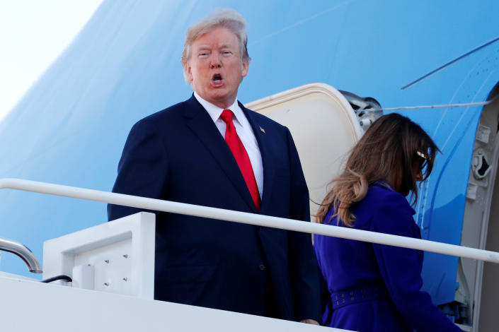 <p>President Donald Trump shouts to reporters as he and and first lady Melania Trump board Air Force One for travel to Hawaii, on his way to an extended trip to five countries in Asia, from Joint Base Andrews, Md., Nov. 3, 2017. (Photo: Jonathan Ernst/Reuters) </p>