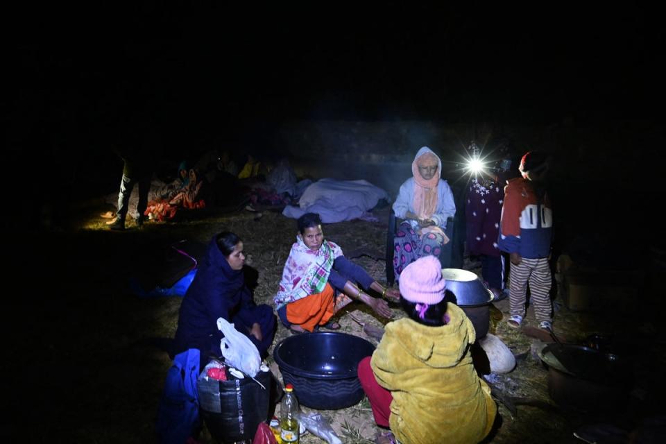 Residents gather at an open air area in Jajarkot district (AFP via Getty Images)
