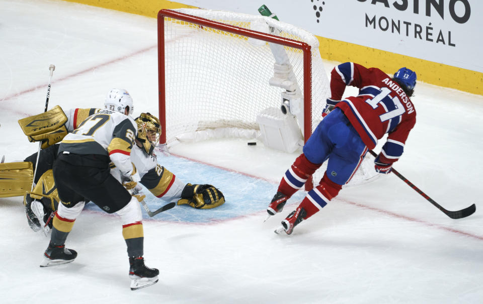 Montreal Canadiens' Josh Anderson scores past Vegas Golden Knights goaltender Marc-Andre Fleury during overtime in Game 3 of an NHL hockey semifinal series, Friday, June 18, 2021, in Montreal. (Paul Chiasson/The Canadian Press via AP)