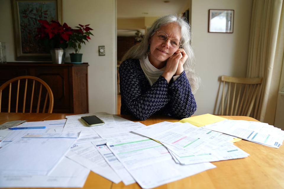 Martha Viehmann, pictured at her home in Anderson Township, Ohio, has kept documentation in pursuit of correcting a medical bill.