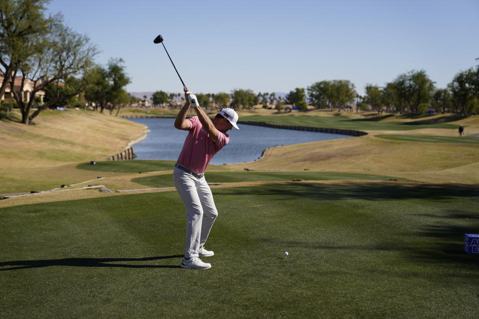 Hudson Swafford hits from the fifth tee during the final round of the American Express golf tournament on the Pete Dye Stadium Course at PGA West, Sunday, Jan. 23, 2022, in La Quinta, Calif. (AP Photo/Marcio Jose Sanchez)