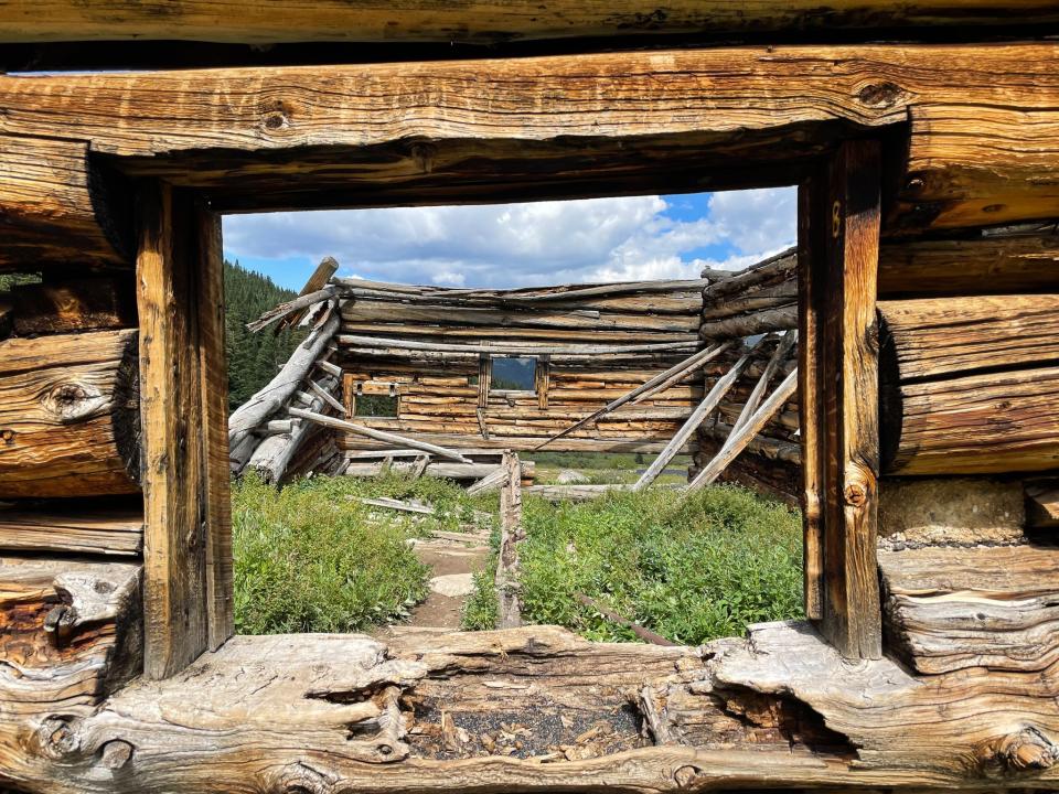 A view through the window of one of the abandoned buildings.