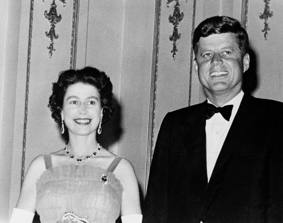 FILE - This is a June 5, 1961 file photo of Queen Elizabeth II and U.S. President John Kennedy as they pose at Buckingham Palace in London. The Kennedy's were dinner guests of the Queen. (AP Photo, File)