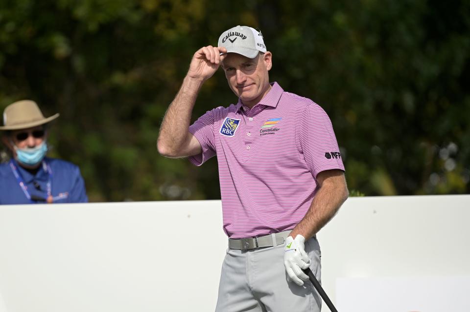 Jim Furyk acknowledges the crowd before hitting his opening tee shot at the PNC Championship in December 2020, in Orlando, Florida.
