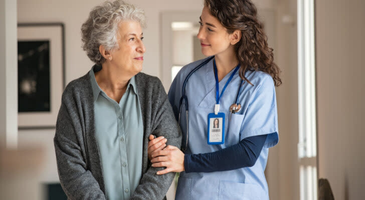 A nurse is helping a older woman. Elder care. Senior care.