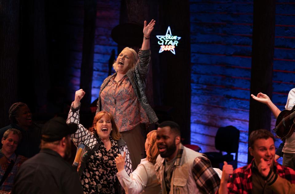 Astrid Van Wieren and the 2021 company of "Come From Away" perform on Broadway.