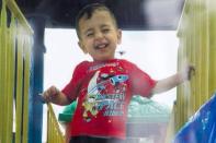 A close up shows Aylan Kurdi in an undated Kurdi family photograph placed outside the home of their aunt Tima Kurdi in Coquitlam, British Columbia September 3, 2015. REUTERS/Kurdi family/Handout via Reuters