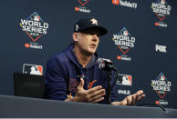 FILE - In this Oct. 28, 2019, file photo, Houston Astros manager AJ Hinch talks to the media during a news conference for baseball's World Series, in Houston. Houston manager AJ Hinch and general manager Jeff Luhnow were suspended for the entire season Monday, Jan. 13, 2020, and the team was fined $5 million for sign-stealing by the team in 2017 and 2018 season. Commissioner Rob Manfred announced the discipline and strongly hinted that current Boston manager Alex Cora — the Astros bench coach in 2017 — will face punishment later. Manfred said Cora developed the sign-stealing system used by the Astros. (AP Photo/Eric Gay, File)