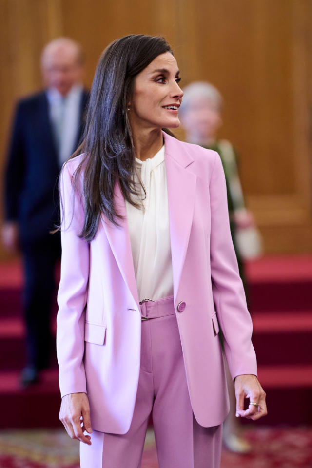 Queen Letizia repeats petal pink BOSS pant suit for Scientific