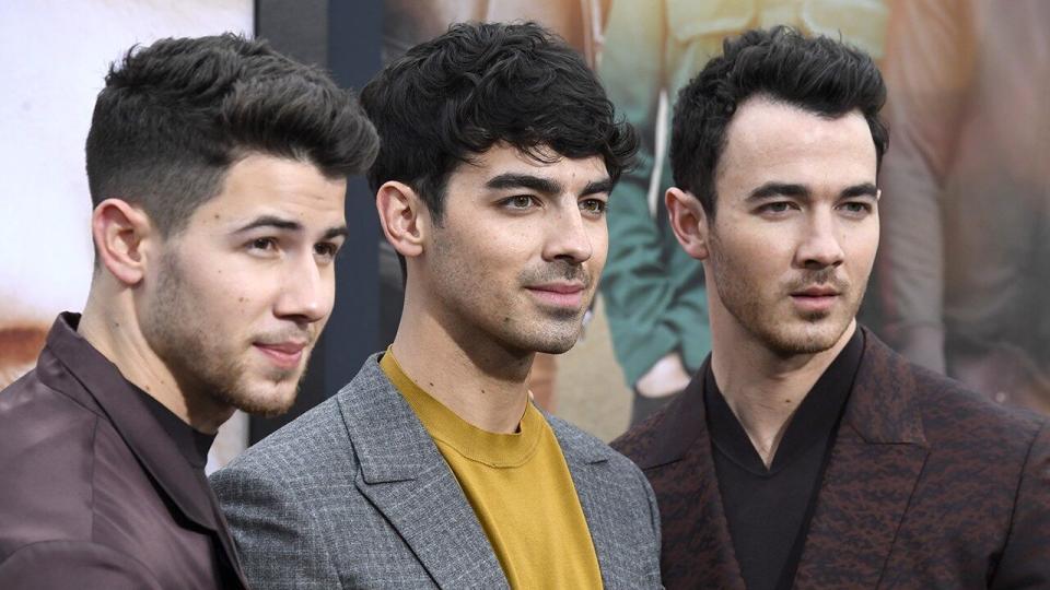 Nick, Joe and Kevin Jonas received the prestigious award on Sunday in California.