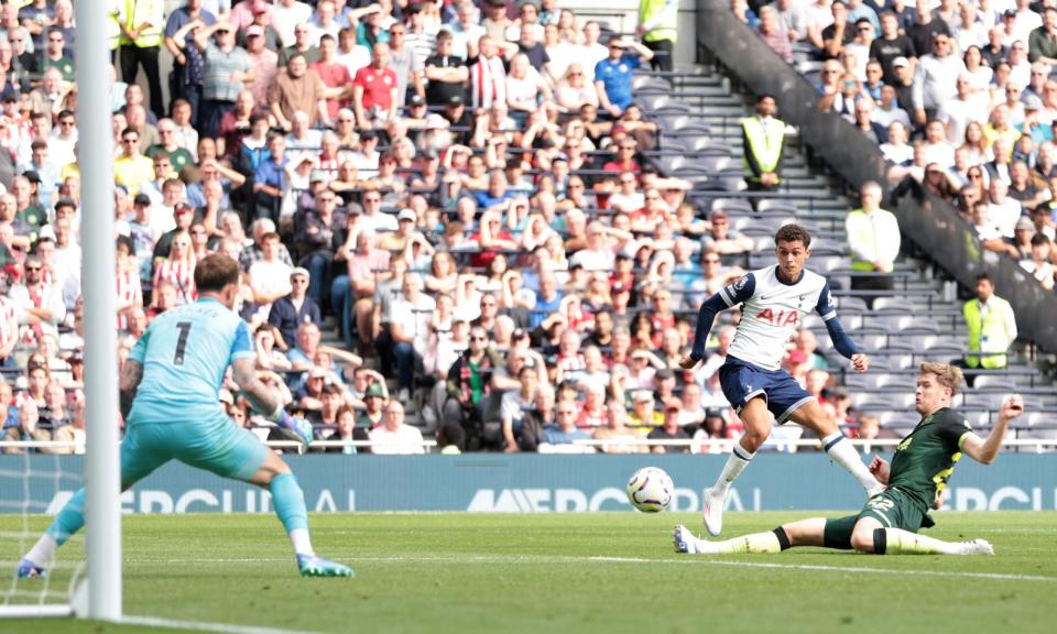 <span>Brennan Johnson scores the second goal for Spurs against Brentford.</span><span>Photograph: Steven Paston/PA</span>