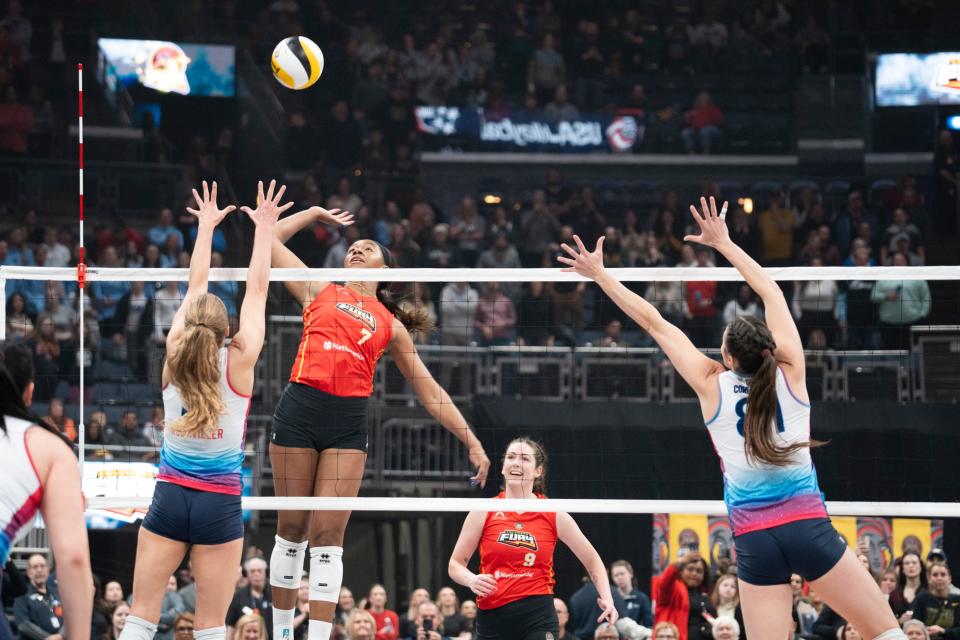 Feb 21, 2024; Columbus, OH, USA; Middle Blocker, Asjia O'Neal, spikes the ball during the Columbus Fury home game against the Omaha Supernovas at Nationwide Arena.