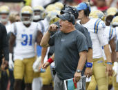 UCLA head coach Chip Kelly shouts on the sidelines in the second quarter of an NCAA college football game against Oklahoma in Norman, Okla., Saturday, Sept. 8, 2018. (AP Photo/Sue Ogrocki)