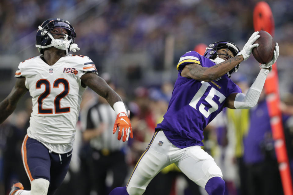 Minnesota Vikings wide receiver Alexander Hollins (15) catches a pass ahead of Chicago Bears defensive back Kevin Toliver (22) during the second half of an NFL football game, Sunday, Dec. 29, 2019, in Minneapolis. (AP Photo/Andy Clayton-King)