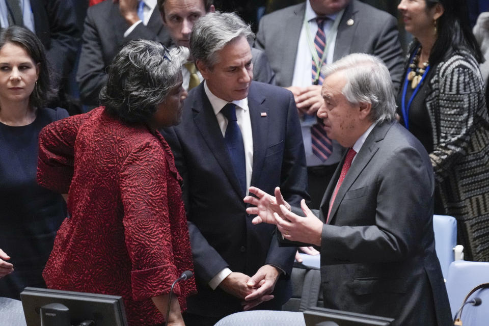 U.S. Secretary of State Antony Blinken, center, and U.S. Ambassador to the United Nations Linda Thomas-Greenfield, left, talk with UN Secretary-General Antonio Guterres before a Security Council meeting at United Nations headquarters, Tuesday, Oct. 24, 2023. (AP Photo/Seth Wenig)