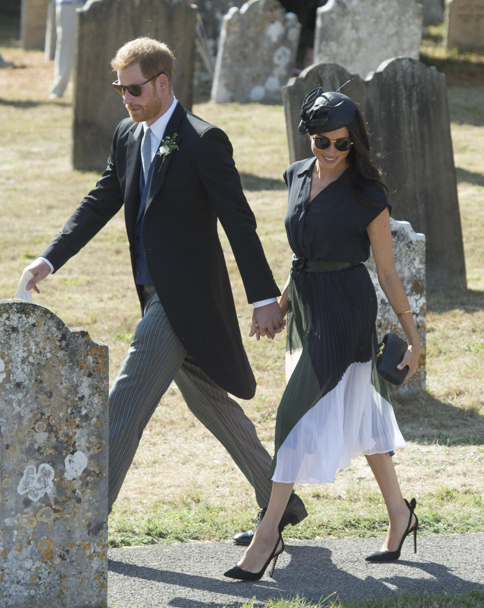 The Duke and Duchess of Sussex attend the wedding of Charlie Van Straubenzee and Daisy Jenks on Aug. 4 in Frensham, United Kingdom. Prince Harry attended the same prep school as Charlie van Straubenzee and they have been good friends ever since. (Photo: Antony Jones via Getty Images)