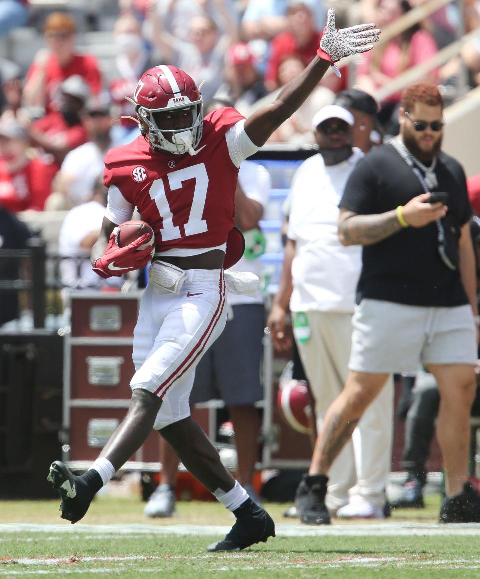 Crimson wide receiver Agiye Hall (17) signals a first down after making a difficult catch during the University of Alabama A-Day game Saturday, April 17, 2021, in Bryant-Denny Stadium. [Staff Photo/Gary Cosby Jr.]