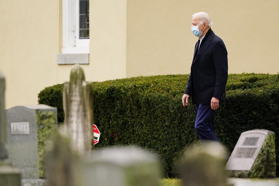 President Joe Biden walks from St. Joseph on the Brandywine Catholic Church in Wilmington, Del., Saturday, Dec. 18, 2021. (AP Photo/Matt Rourke)