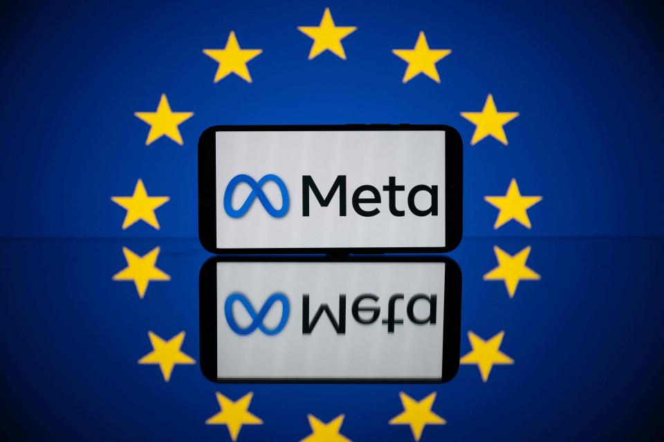 This picture taken on April 27, 2023 in Toulouse, southwestern France, shows a screen displaying the Meta logo and the European flag. - European commissioner for the Internal Market Thierry Breton unveiled a list of 19 online platforms, including Instagram, TikTok and Twitter, as having user numbers so big they will come under stricter regulatory rules for content. The list which also includes services from Amazon, Google, Meta, Instagram and Microsoft puts them in a category under a new EU law, known as the Digital Services Act (DSA), imposing measures from August such as annual audits and a duty to effectively counter disinformation and hate content.