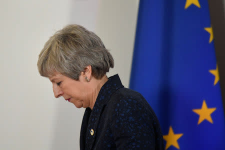 Britain's Prime Minister Theresa May leaves after giving a news briefing in Brussels, Belgium March 22, 2019. REUTERS/Toby Melville