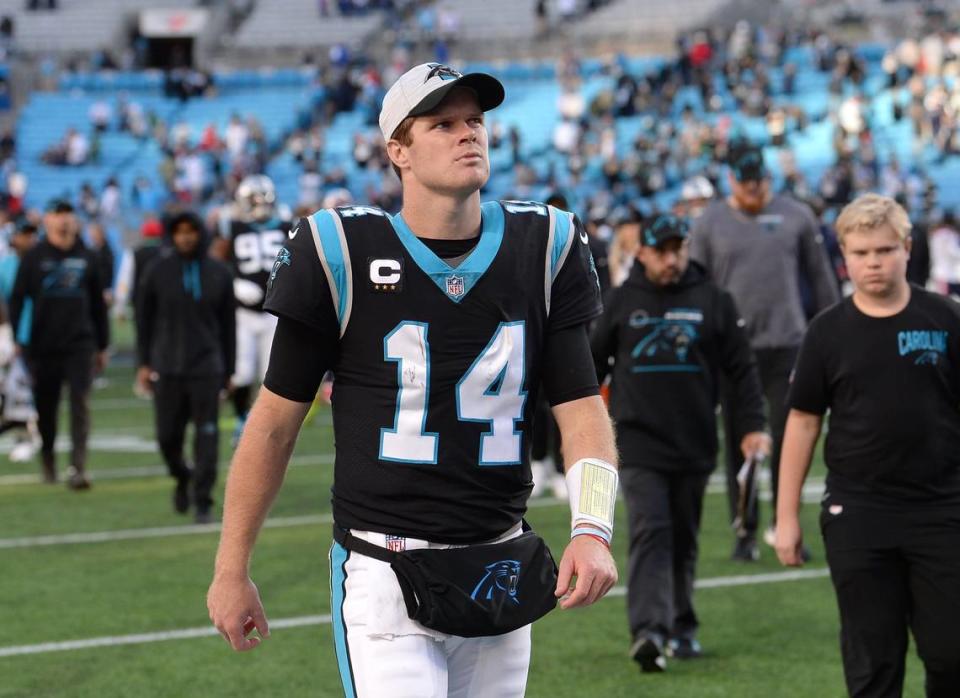 Carolina Panthers quarterback Sam Darnold walks off the field following the team’s 24-6 loss to the New England Patriots at Bank of America Stadium in Charlotte, NC on Sunday, November 7, 2021. Darnold threw three interceptions in the defeat.