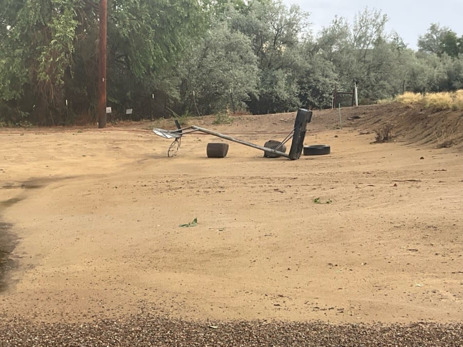 <em>Weather knocks over basketball hoop on June 22 near Bloomfield, NM | Photo by Damian Martinez</em>