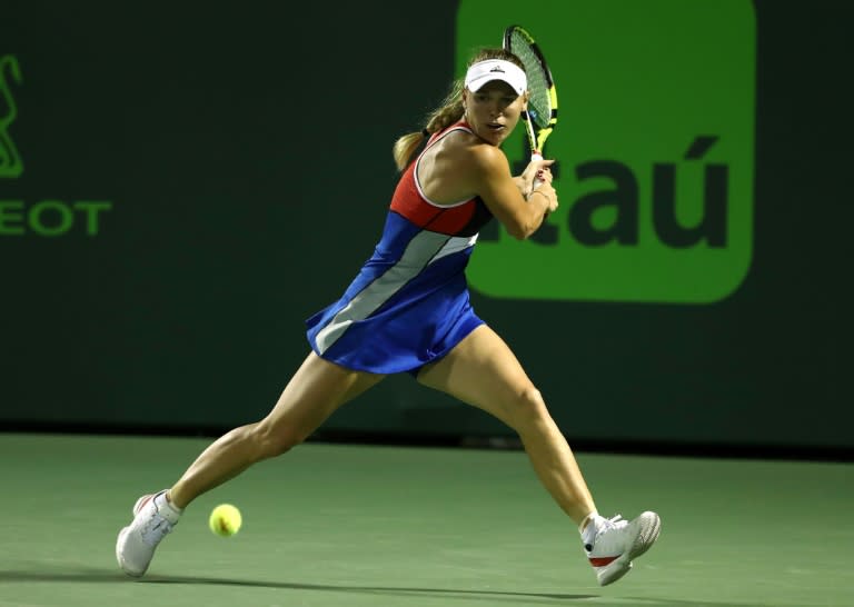 Caroline Wozniaki slumped to a shock 0-6, 6-4, 6-4 defeat to Monica Puig of Puerto Rico at the Miami Open
