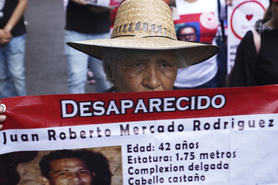 Mothers with disappeared children march to demand government help in the search for their missing loved ones on Mother's Day in Mexico City, Wednesday, May 10, 2023. (AP Photo/Marco Ugarte)