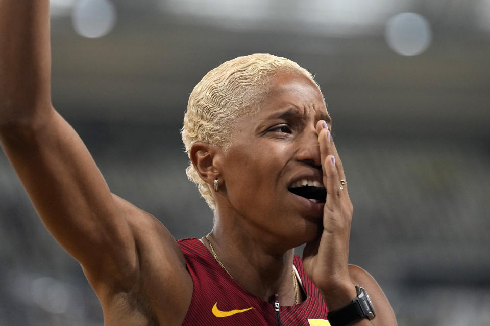 Yulimar Rojas, of Venezuela, reacts after winning the Women's triple jump final during the World Athletics Championships in Budapest, Hungary, Friday, Aug. 25, 2023. (AP Photo/Ashley Landis)