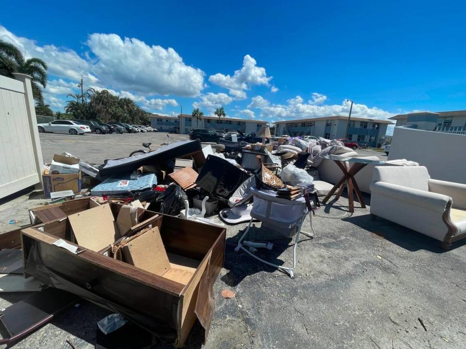 Water-damaged furniture waits to be picked up at the Stillwater Cove apartments in Naples’ River Park neighborhood on Saturday, Oct. 1, 2022. The area was damaged due to floodwaters from Hurricane Ian.