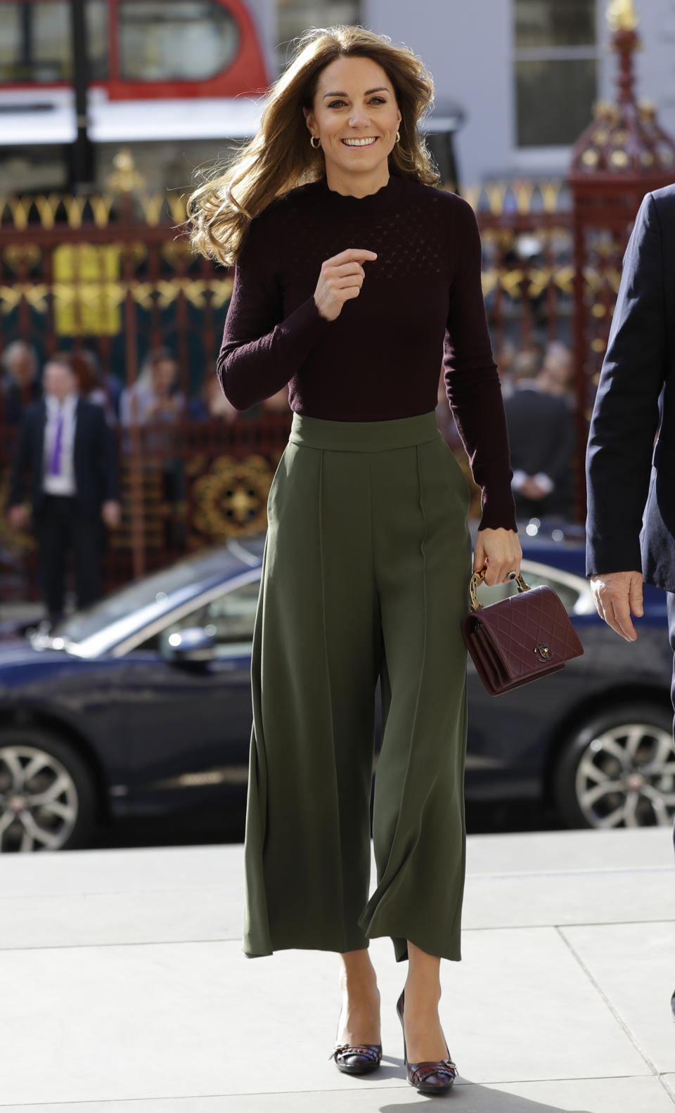 The Duchess of Cambridge arrived at The Natural History Museum wearing Jigsaw trousers and a Warehouse jumper. [Photo: Getty]