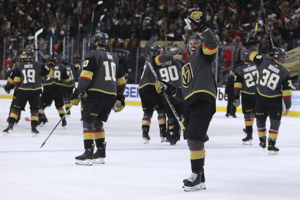 Vegas Golden Knights center Jonathan Marchessault (81) celebrates after the Golden Knights defeated the Minnesota Wild 6-2 in Game 7 of an NHL hockey Stanley Cup first-round playoff series Friday, May 28, 2021, in Las Vegas. (AP Photo/Joe Buglewicz)