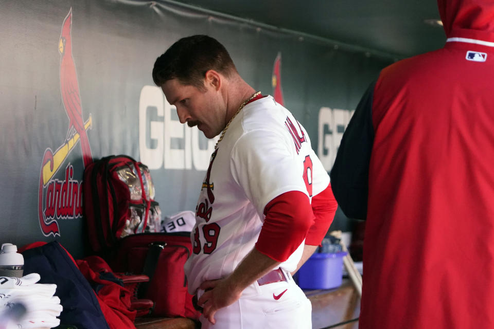 St. Louis Cardinals starting pitcher Miles Mikolas pauses in the dugout after working during the first inning of a baseball game against the Pittsburgh Pirates Saturday, April 9, 2022, in St. Louis. (AP Photo/Jeff Roberson)