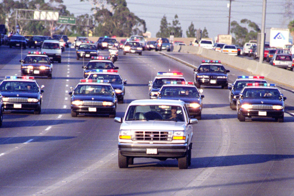 California Highway Patrol chase Al Cowlings, driving, and O.J. Simpson, hiding in rear of white Bronco on the 91 Freeway, just West of the I5 freeway. The chase ended in Simpson's arrest at his Brentwood home. (Photo by Allen J. Schaben/Los Angeles Times via Getty Images)